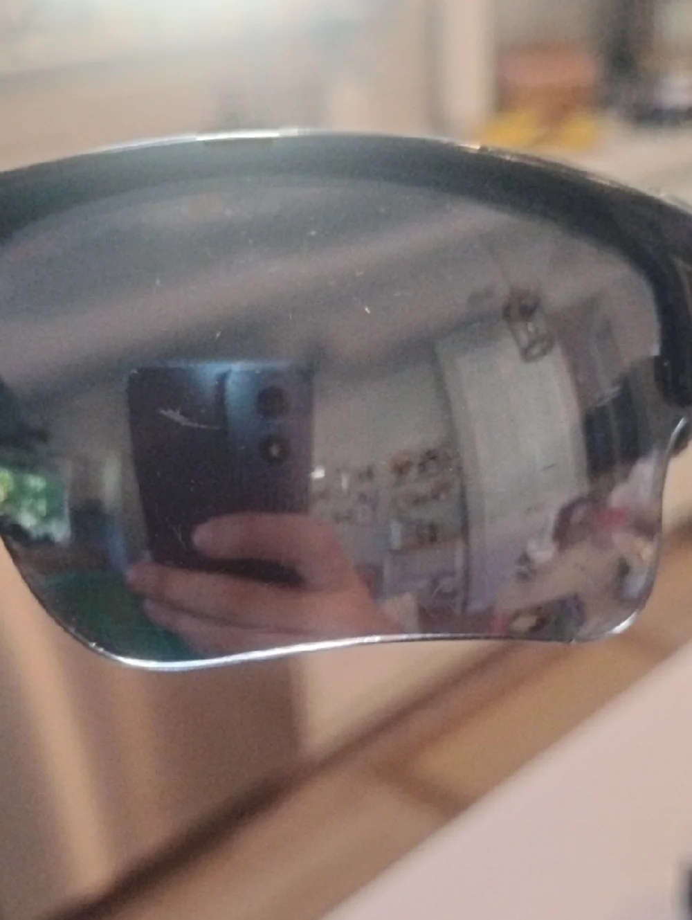 Oakley Black Frame Sunglasses with Gray And Orange Lenses